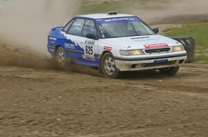 Mike Wray / Don DeRose Subaru Legacy Sport drifts through the infield at the Bemidji Speedway, SS8.