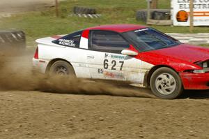 Marcin Kowalski / Maciej Sawicki Mitsubishi Eclipse GST drifts through the infield at the Bemidji Speedway, SS8.