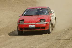 Marcin Kowalski / Maciek Sawicki Mitsubishi Eclipse GST exits out of the final corner at the Bemidji Speedway, SS8.