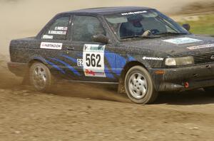 Brian Dondlinger / Dave Parps Nissan Sentra SE-R slings gravel through the infield at the Bemidji Speedway, SS8.