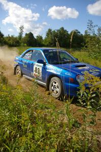Mark Utecht / Rob Bohn Subaru WRX at speed through one of the fastest sections on SS10, Chad's Yump.