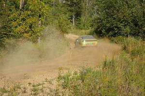 Doug Shepherd / Pete Gladysz Mitsubishi Eclipse drifts through a fast left-hander on SS10, Chad's Yump.