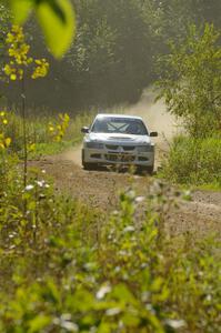 Tim Paterson / John Allen Mitsubishi Lancer Evo VIII drift out of a fast left-hander on SS10, Chad's Yump.
