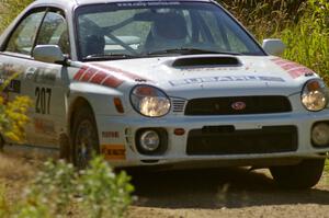 Dave Hintz / Rick Hintz Subaru WRX at speed on a straight on SS10, Chad's Yump.