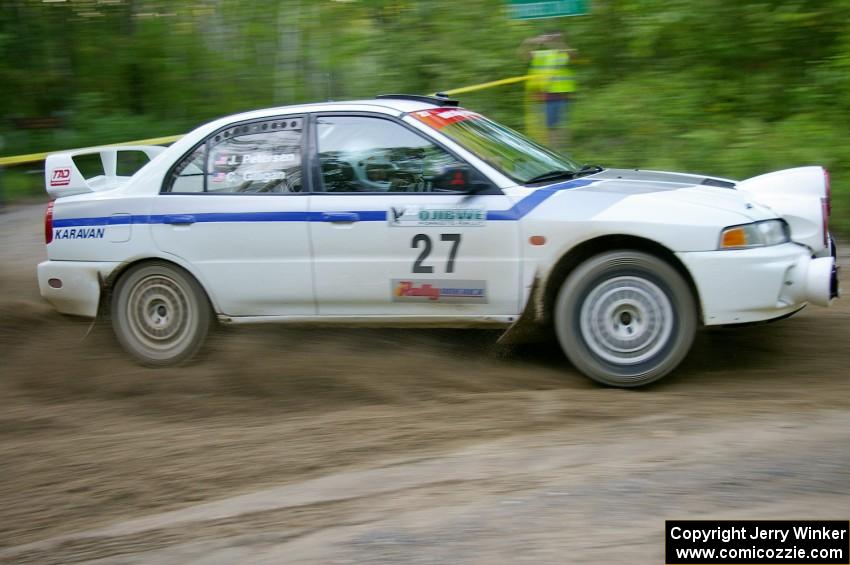 Chris Gilligan / Joe Petersen Mitsubishi Lancer Evo IV drifts through a 90-right on SS2, Spur 2.