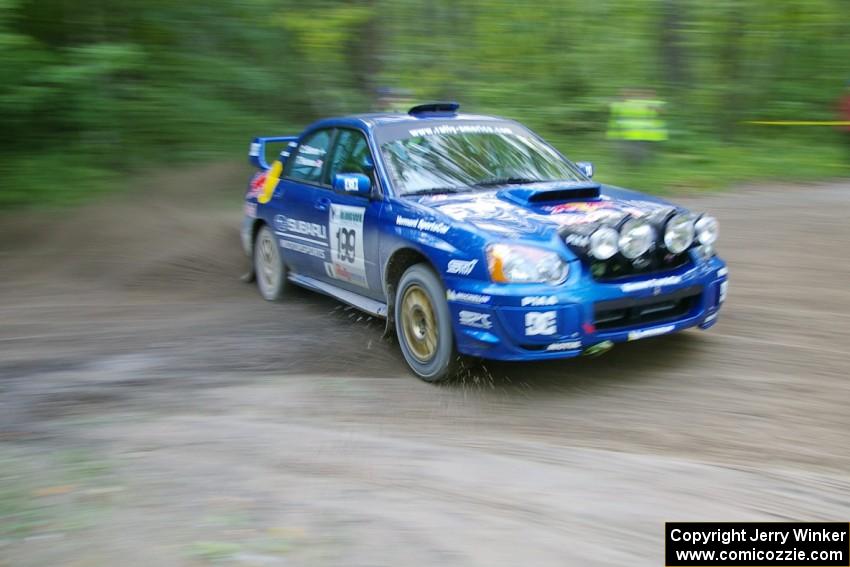 Travis Pastrana / Christian Edstrom Subaru WRX STi drifts through a 90-right on SS2, Spur 2.