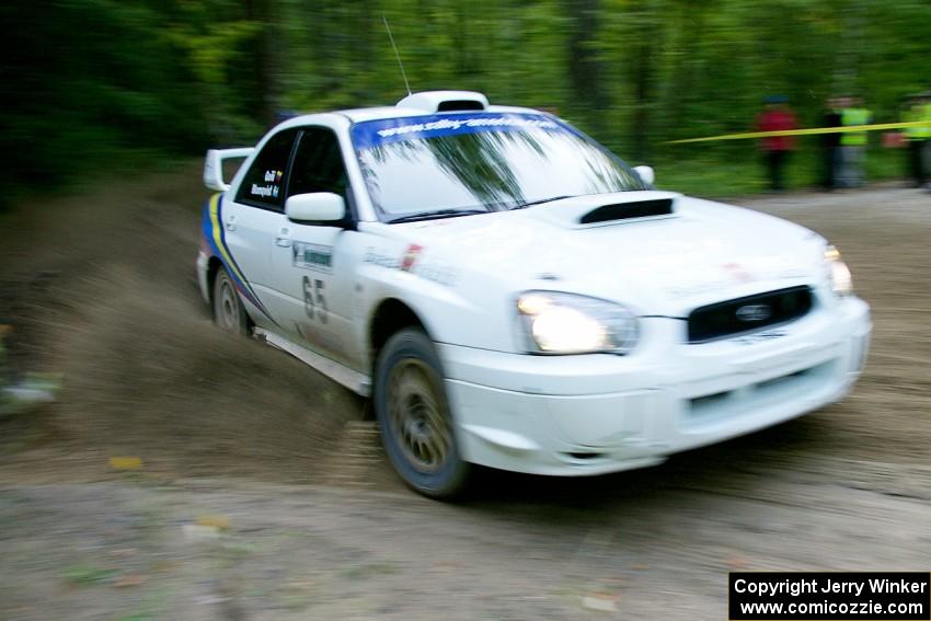 Stig Blomqvist / Ana Goni drift their Subaru WRX STi beautifully through a 90-right on SS2, Spur 2.