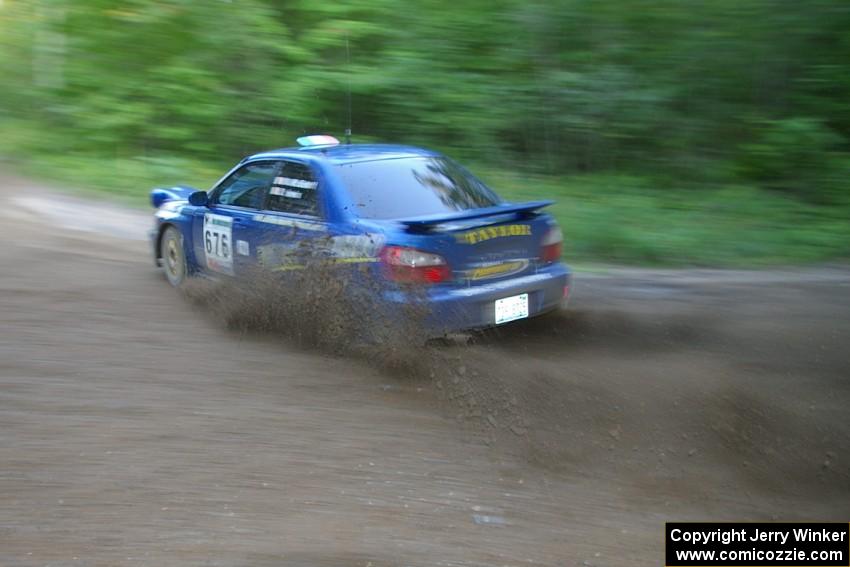 Mark McElduff / Damien Irwin Subaru WRX STi drifts through a 90-right on SS2, Spur 2.