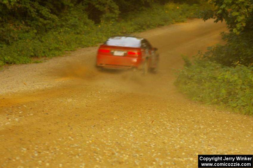 Cary Kendall / Scott Friberg at speed in their Eagle Talon on an uphill section of SS2, Spur 2.