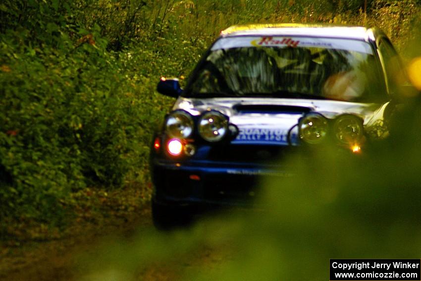 Eric Langbein / Jeremy Wimpey Subaru WRX blasts uphill on a straight on SS2, Spur 2.