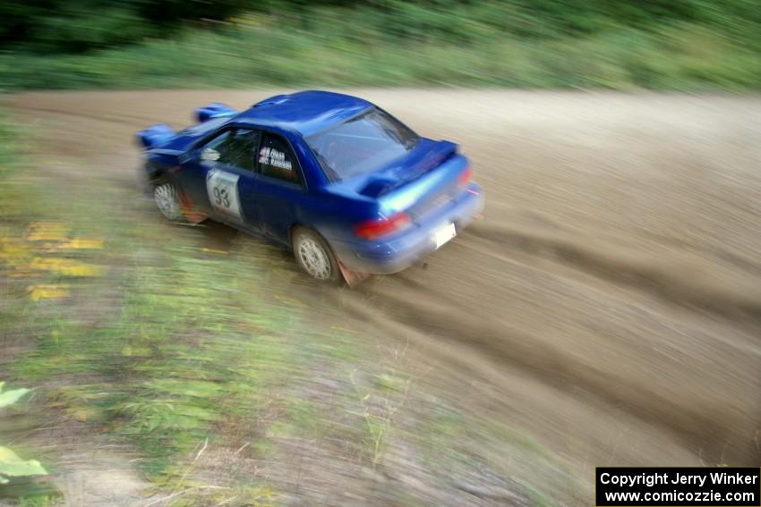 Bob Olson / Conrad Ketelson Subaru 2.5RS at speed through a fast uphill left-hander on SS2, Spur 2.