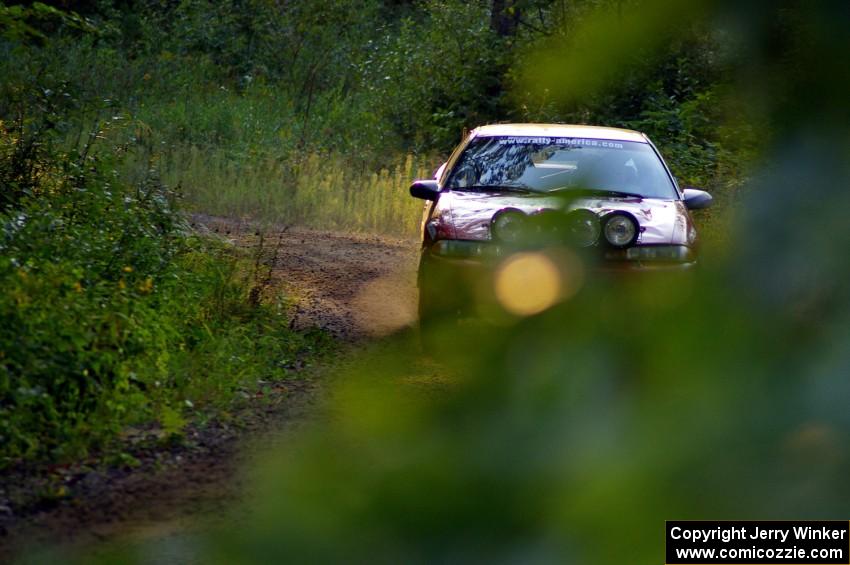 Micah Wiitala / Jason Takkunen Mitsubishi Eclipse GSX comes uphill out of a 90-right on SS2, Spur 2.