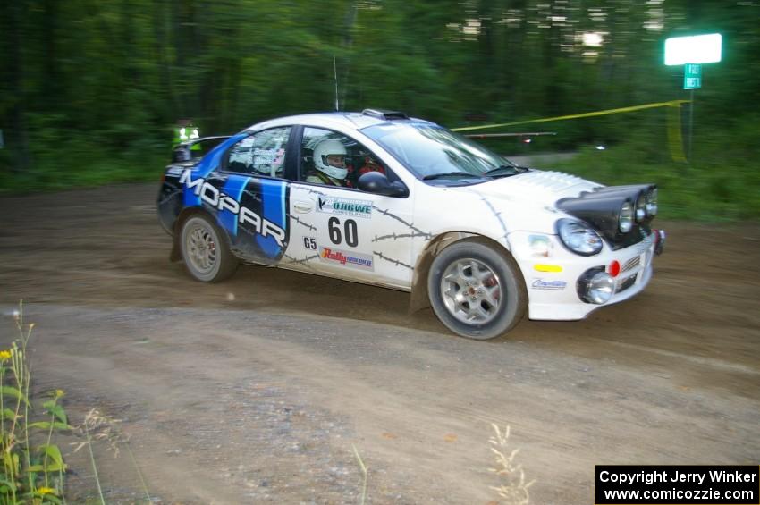 Bruce Davis / Jimmy Brandt Dodge SRT-4 at speed through a 90-right on SS2, Spur 2.