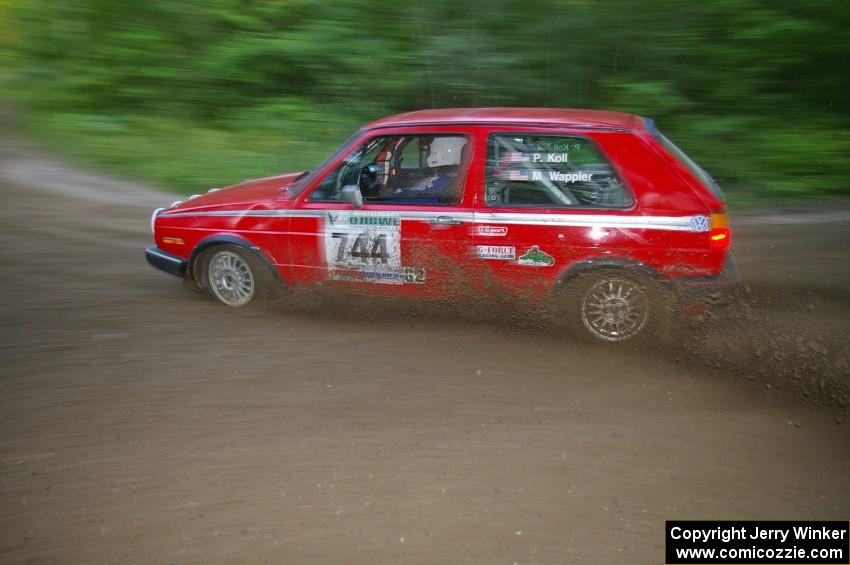 Paul Koll / Matt Wappler VW GTI throws gravel at a 90-right on SS2, Spur 2.