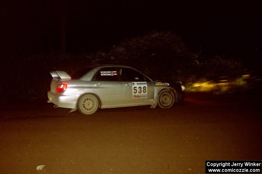 Robert Borowicz / Mariusz Borowicz Subaru WRX STi drifts through a 90-left on SS7, Blue Trail.
