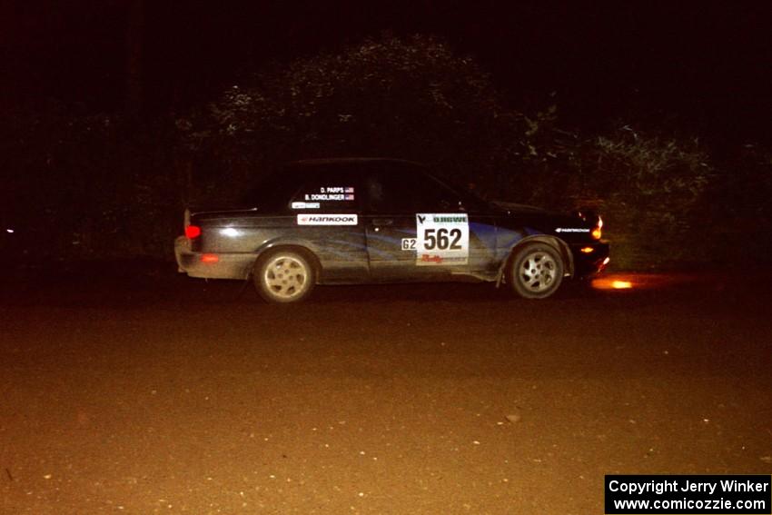 Brian Dondlinger / Dave Parps Nissan Sentra SE-R drifts through a 90-left on SS7, Blue Trail.