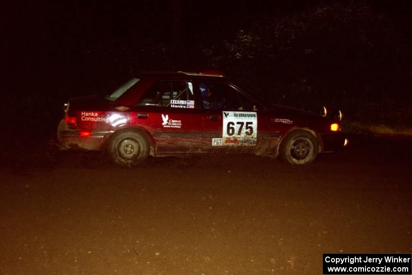 Ben Hanka / John Nordlie Mazda Protege drifts through a 90-left on SS7, Blue Trail.