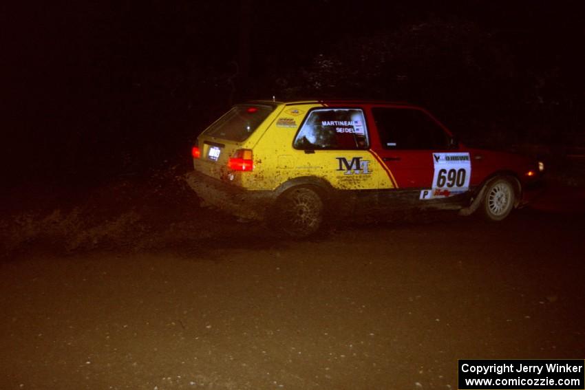 Carl Seidel / Jay Martineau VW GTI drifts through a 90-left on SS7, Blue Trail.