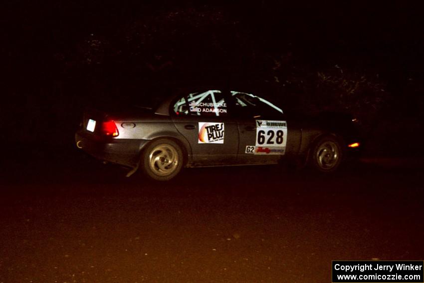 Dan Adamson / Jeremiah Schubitzke Saturn SL2 through a 90-left on SS7, Blue Trail.