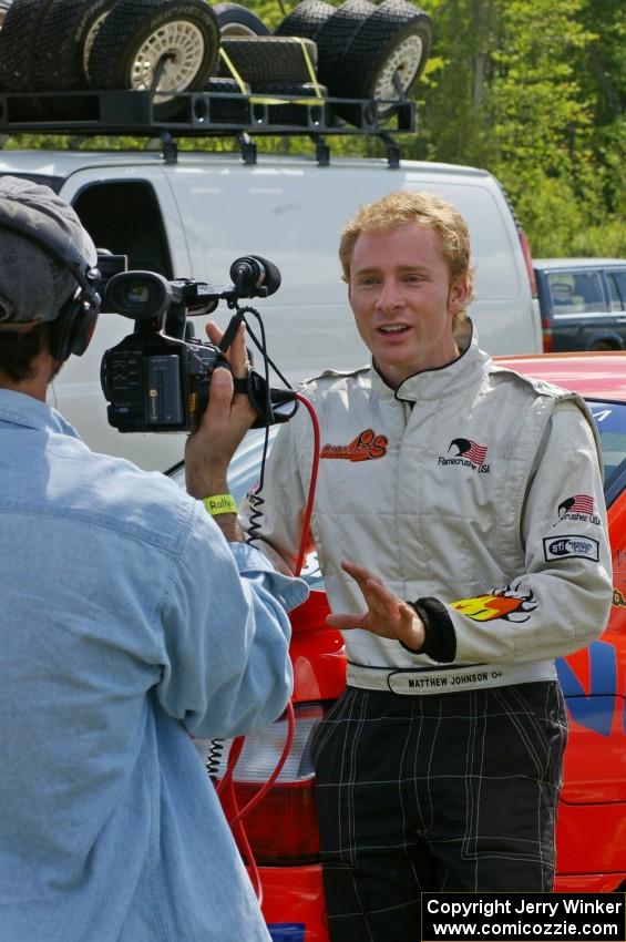 Matthew Johnson is interviewed prior to the start of the Bemidji Speedway stage.