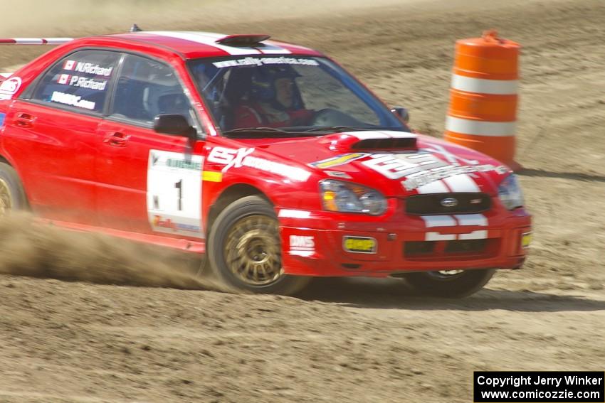 Pat Richard / Nathalie Richard Subaru WRX STi drifts out of the high-bank down to the infield on Bemidji Speedway, SS8.