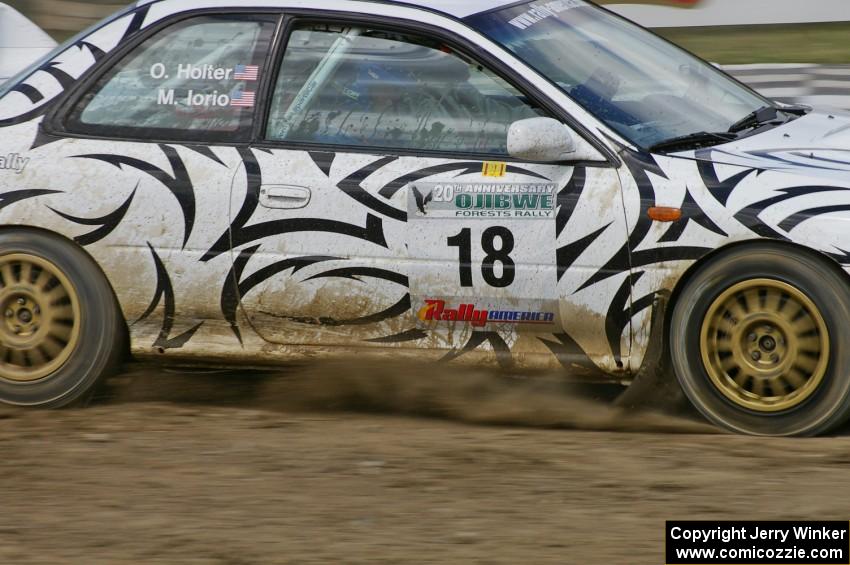 Matt Iorio / Ole Holter power through a fast sweeper on SS8, Bemidji Speedway, in their Subaru Impreza.