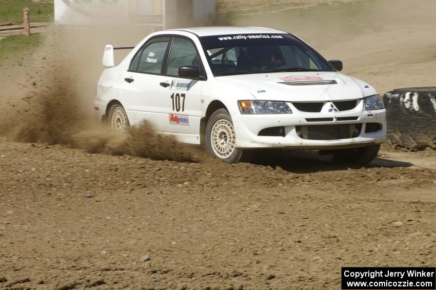 Tim Paterson / John Allen Mitsubishi Lancer Evo VIII sprays gravel through the infield at the Bemidji Speedway, SS8.