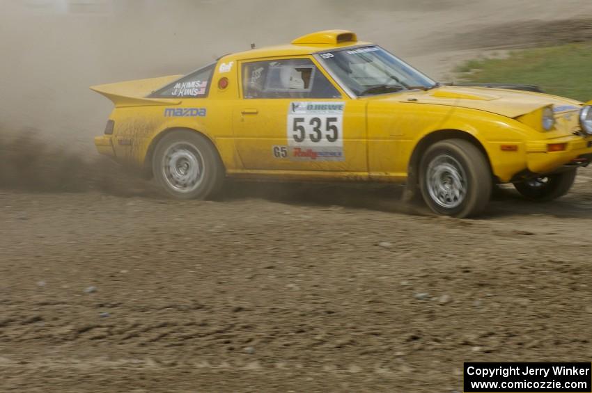 Jake Himes / Matt Himes Mazda RX-7 slings gravel through the infield at the Bemidji Speedway, SS8.