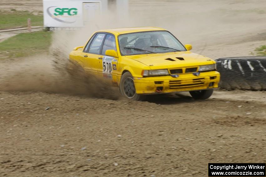 Erik Payeur / Adam Payeur Mitsubishi Galant sprays gravel through the infield at the Bemidji Speedway, SS8.