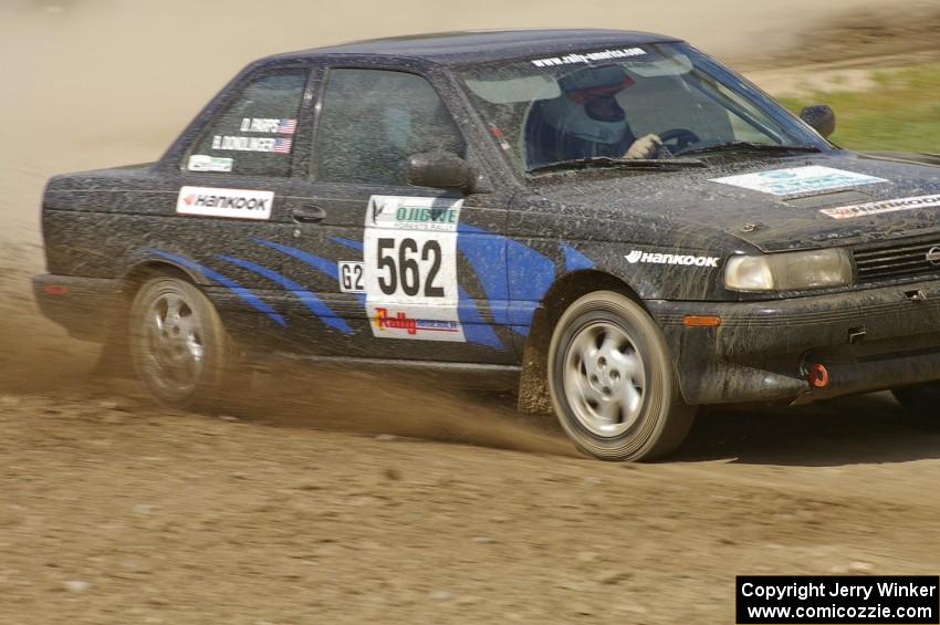 Brian Dondlinger / Dave Parps Nissan Sentra SE-R slings gravel through the infield at the Bemidji Speedway, SS8.