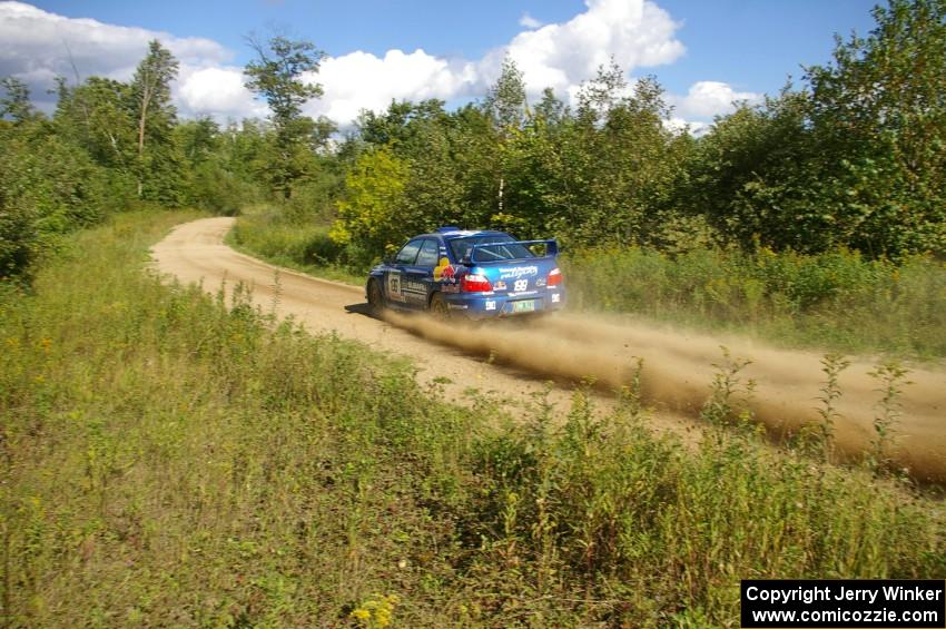 Travis Pastrana / Christian Edstrom Subaru WRX STi at speed on SS10, Chad's Yump.