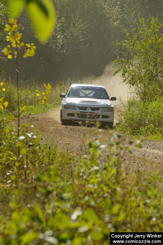 Tim Paterson / John Allen Mitsubishi Lancer Evo VIII drift out of a fast left-hander on SS10, Chad's Yump.