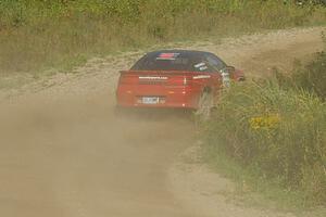 Micah Wiitala / Jason Takkunen Mitsubishi Eclipse GSX goes through an uphill left sweeper on SS10, Chad's Yump.