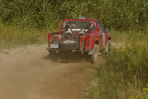 Jim Cox / Richard Donovan Chevy S-10 through an uphill sweeper on SS10, Chad's Yump.