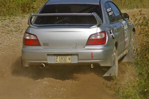 Robert Borowicz / Mariusz Borowicz Subaru WRX STi drifts through an uphill left on SS10, Chad's Yump.