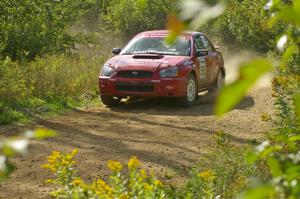 John Cirisan / Josh Hamacher Subaru WRX through an uphill right on SS10, Chad's Yump.