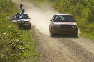 Paul Koll / Matt Wappler VW GTI drives past Dave Sterling/ Stacy Sterling Dodge Omni GLH who DNF'ed with a broken transmission.