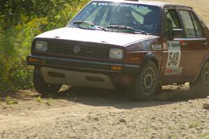 Matt Bushore / Andy Bushore VW Jetta through an uphill left on SS10, Chad's Yump.