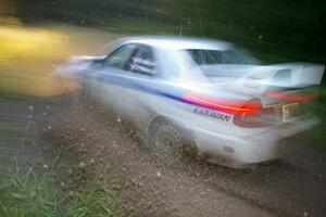 Chris Gilligan / Joe Petersen Mitsubishi Lancer Evo IV at speed through the spectator point on SS13, Sockeye Lake.