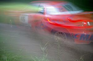 Matthew Johnson / Wendy Nakamoto Subaru WRX at speed through the spectator point on SS13, Sockeye Lake.