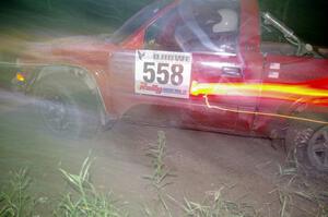 Jim Cox / Richard Donovan Chevy S-10 at speed through the spectator point on SS13, Sockeye Lake.