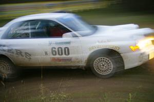 Fintan McCarthy / Noel Gallagher Subaru WRX STi through the spectator point on SS13, Sockeye Lake.