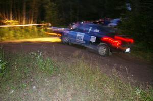 Bryan Holder / Tracy Payeur Plymouth Neon through the spectator point on SS13, Sockeye Lake.
