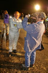 Stig Blomqvist is interviewed after taking his Subaru WRX STi to the win at Ojibwe. Ana Goni was his navigator for the weekend.