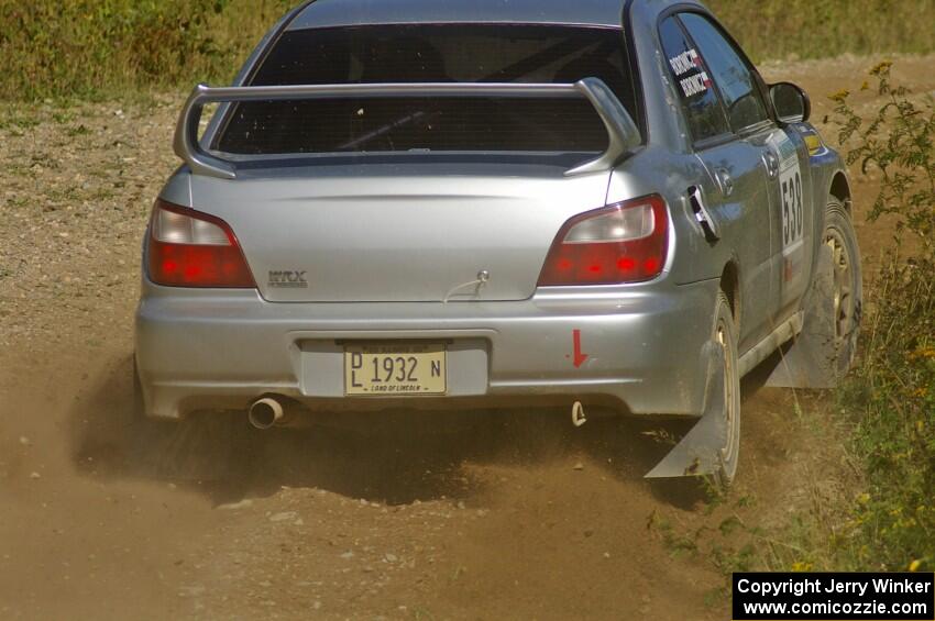 Robert Borowicz / Mariusz Borowicz Subaru WRX STi drifts through an uphill left on SS10, Chad's Yump.