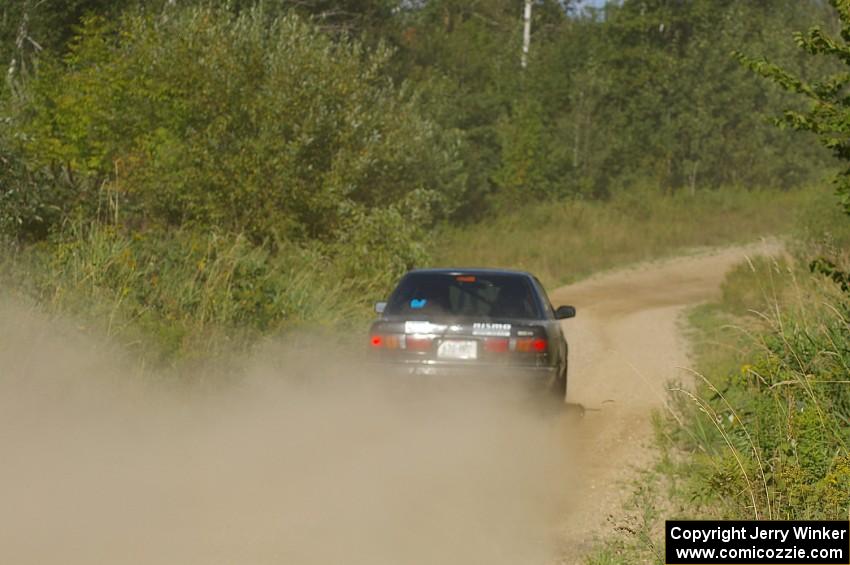 Brian Dondlinger / Dave Parps Nissan Sentra SE-R at speed on SS10, Chad's Yump.