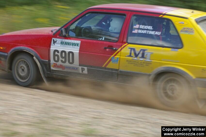 Carl Seidel / Jay Martineau VW GTI goes through an uphill left on SS10, Chad's Yump.