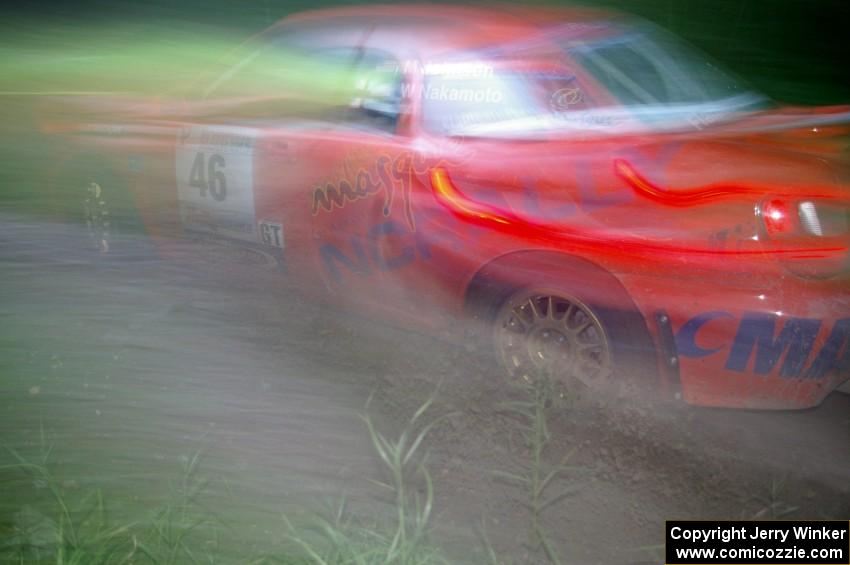 Matthew Johnson / Wendy Nakamoto Subaru WRX at speed through the spectator point on SS13, Sockeye Lake.