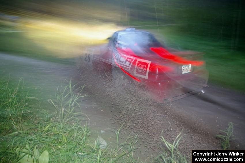 Cary Kendall / Scott Friberg Eagle Talon throws a spray of gravel through the spectator point on SS13, Sockeye Lake.