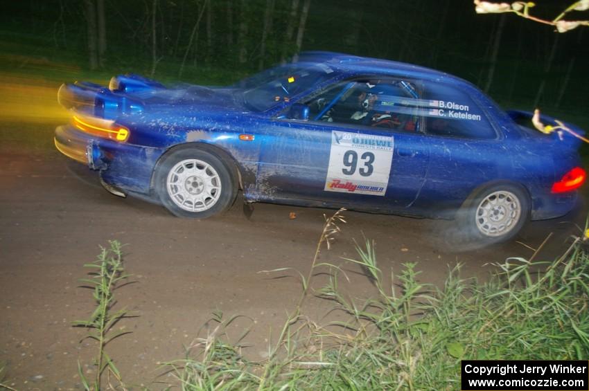 Bob Olson / Conrad Ketelson Subaru 2.5RS at dusk through the spectator point on SS13, Sockeye Lake.